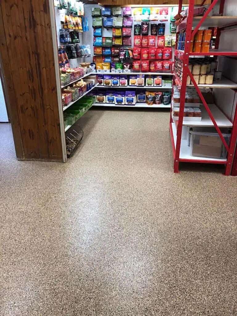 Food storage shelving on an epoxy-coated floor.